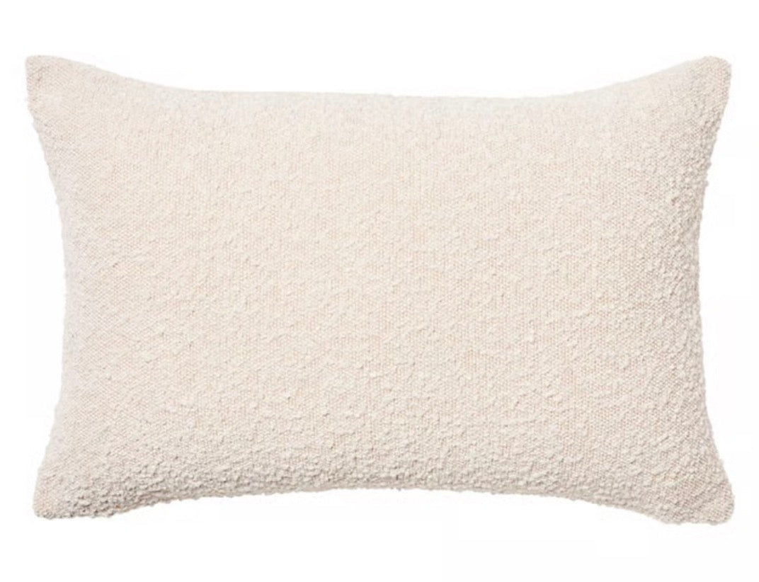 Boucle cream cushion